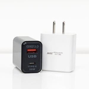 Black and white USB wall charger.