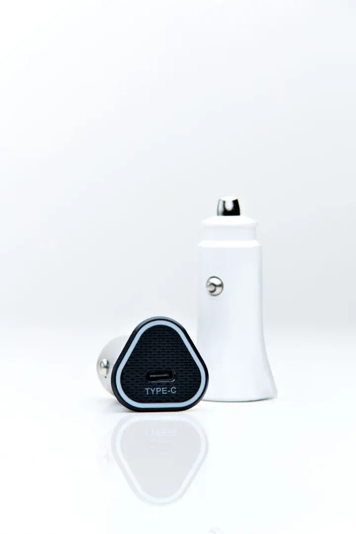 White car charger with type-c adapter.