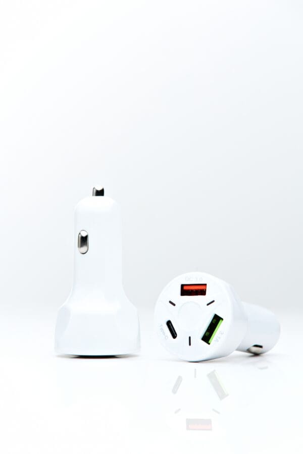 White car charger with multiple ports.