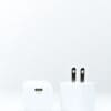 White phone charger with US plug.