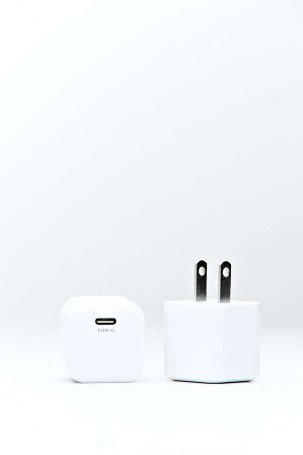 White phone charger with US plug.