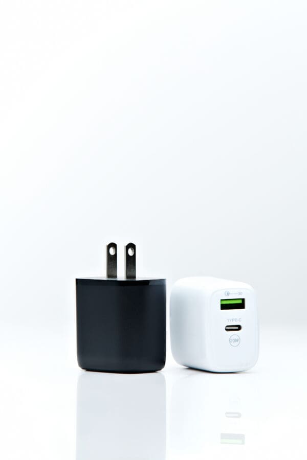 Two phone chargers on white background.