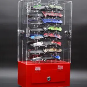 Acrylic display case with pocket knives.