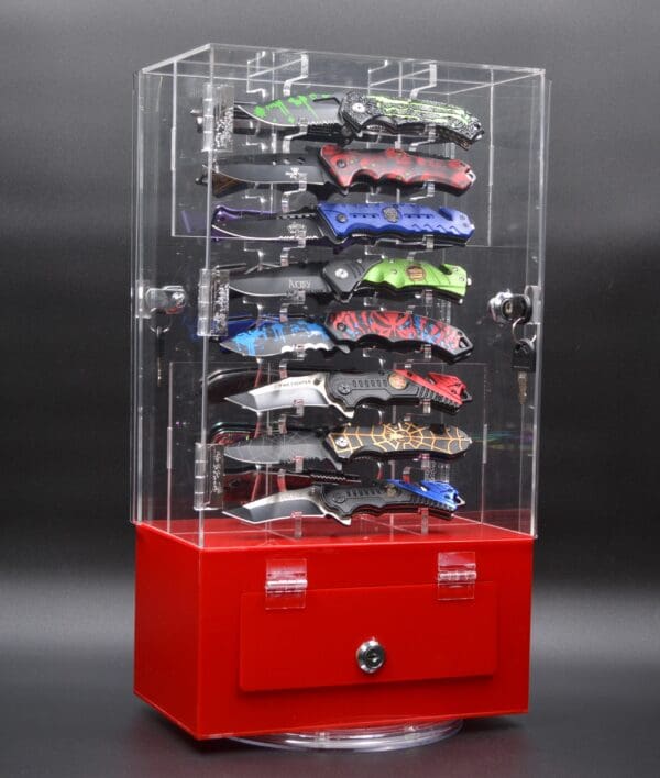 Acrylic display case with pocket knives.