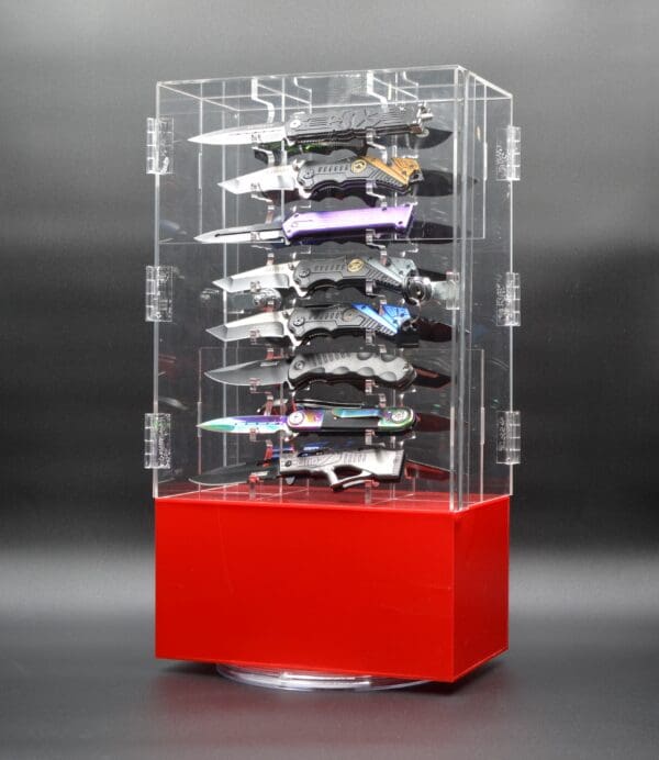 Rotating display case with knives.