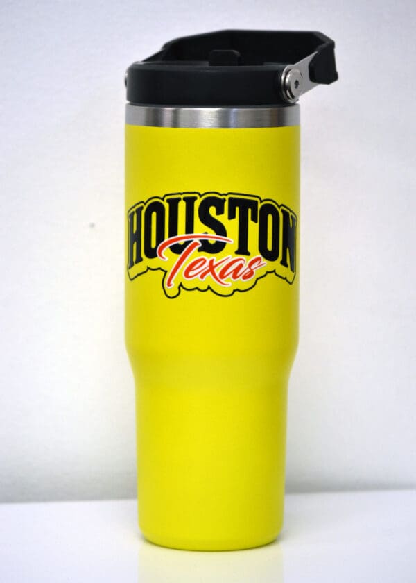 Yellow Houston Texas travel mug.